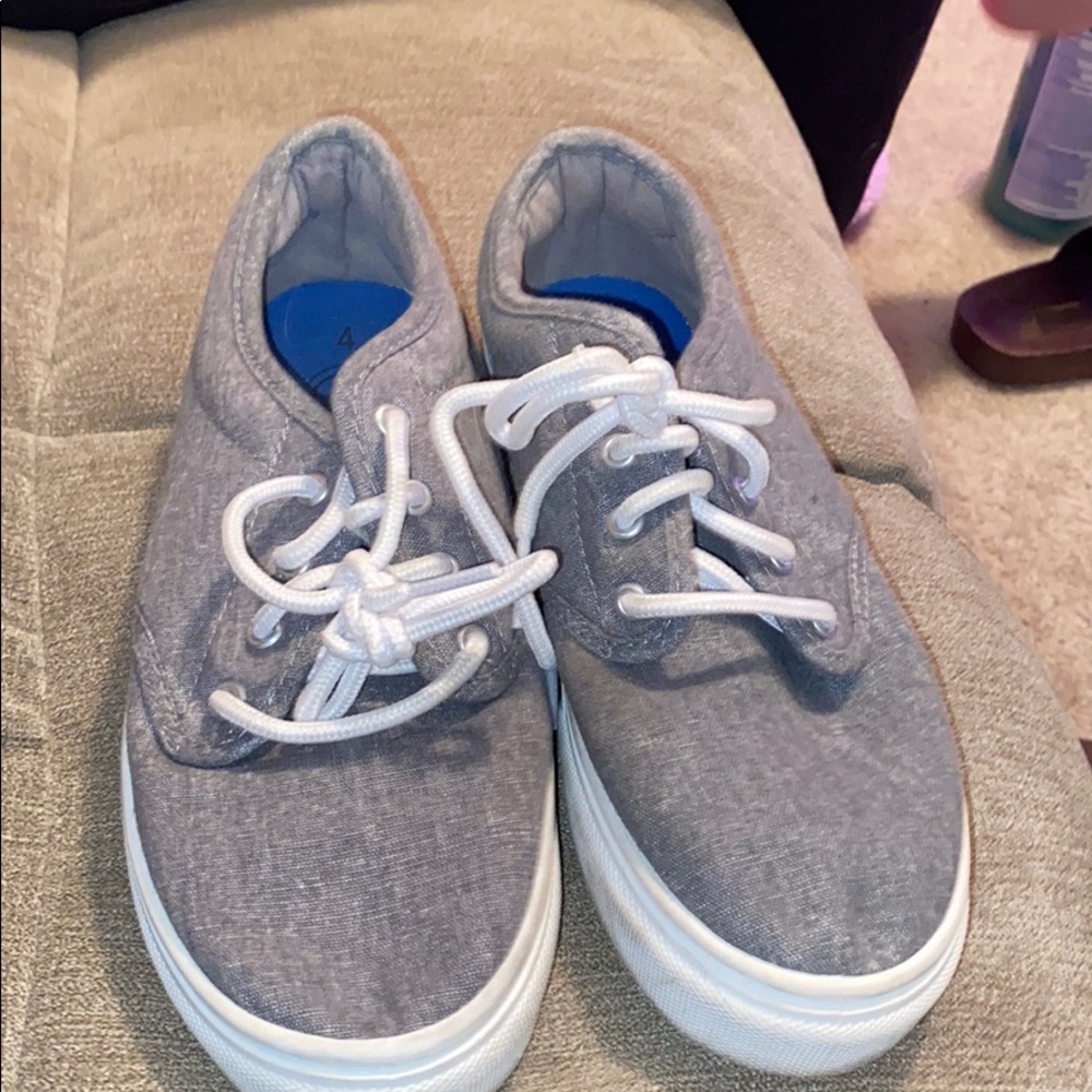 Grey and white sneaker shoes